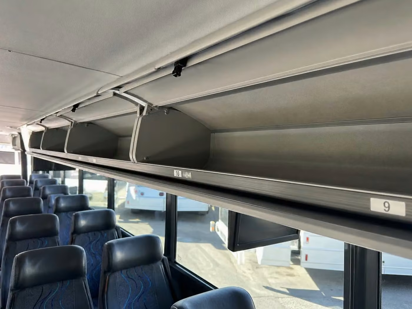 mcdonough charter bus overhead storage